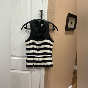 Black and ivory top with faux leather yolk back zip worn once like new